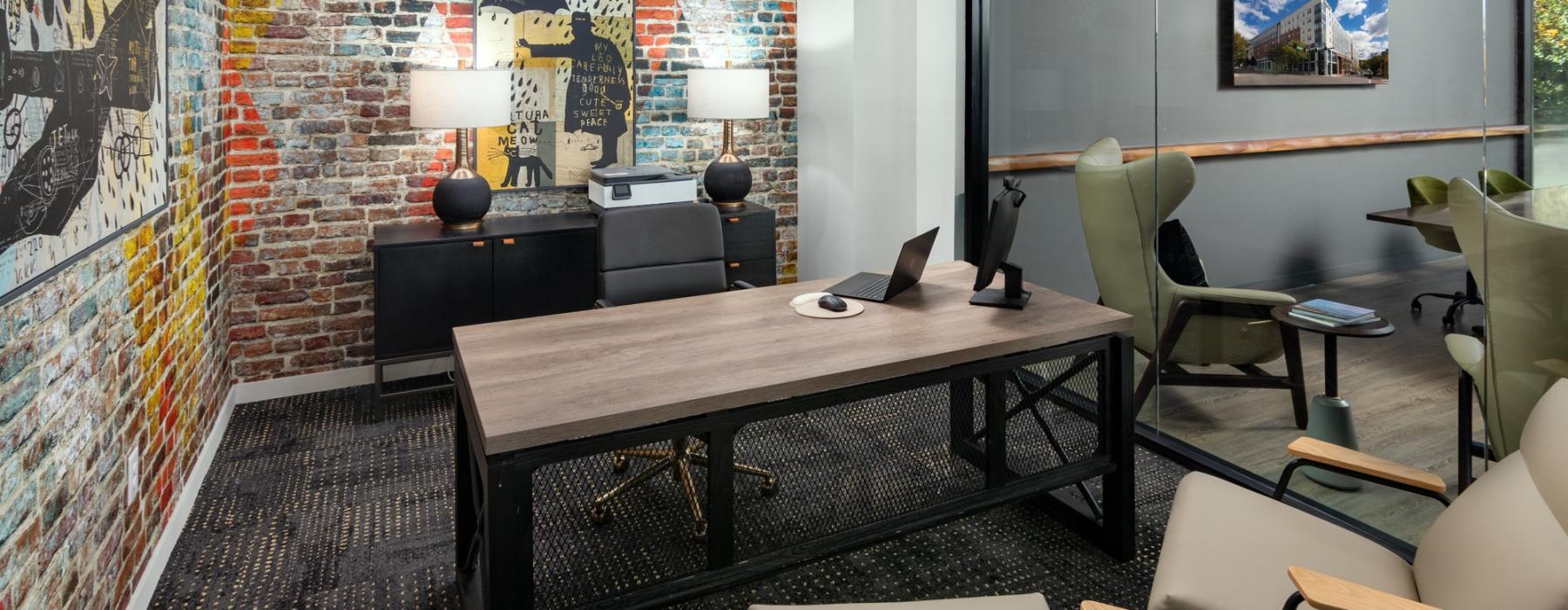 leasing office with colorful brick walls